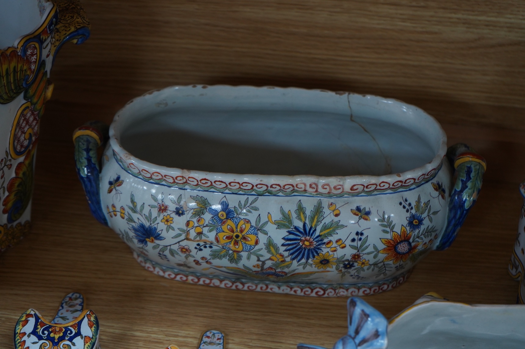 19th century French decorative faience including bag pipes, a large wall pocket, jardiniere etc (22).